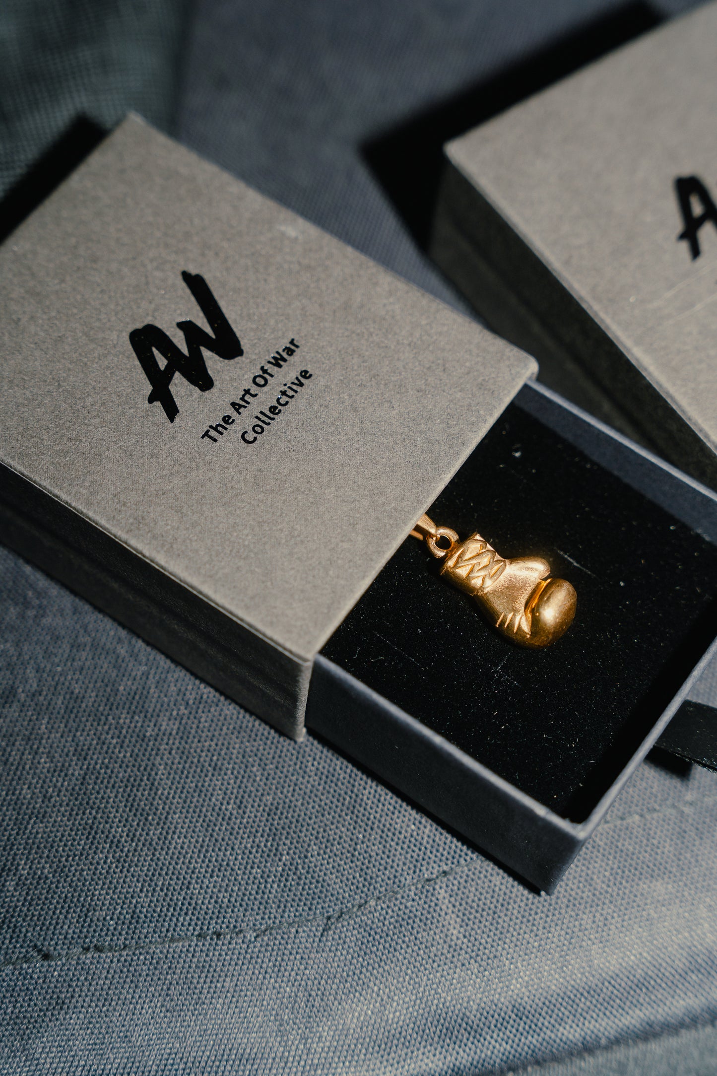 The Golden Glove Pendant